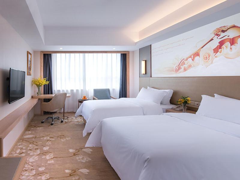Vienna Hotel Shenzhen Pingji Ave Екстер'єр фото